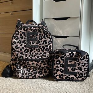 Justice sequin E backpack, lunchbox and water bottle case set.